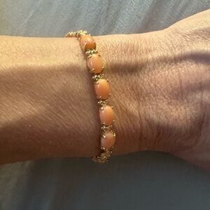 Elegant Gold and Peach Bracelet